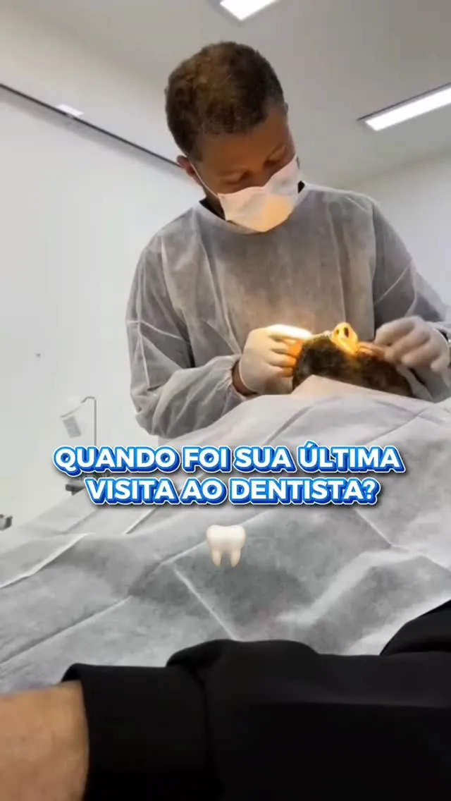 Dentista paramentado realizando atendimento em paciente na Odonto Prime Mauá